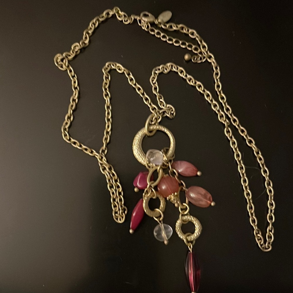 Long length necklace with charm